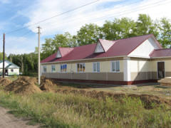 Малоэтажный дом в Русской поляне Омской области